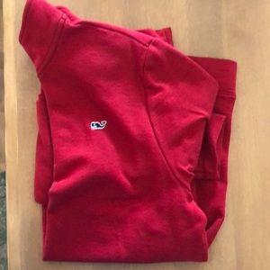 This is a vineyard vines red polo.